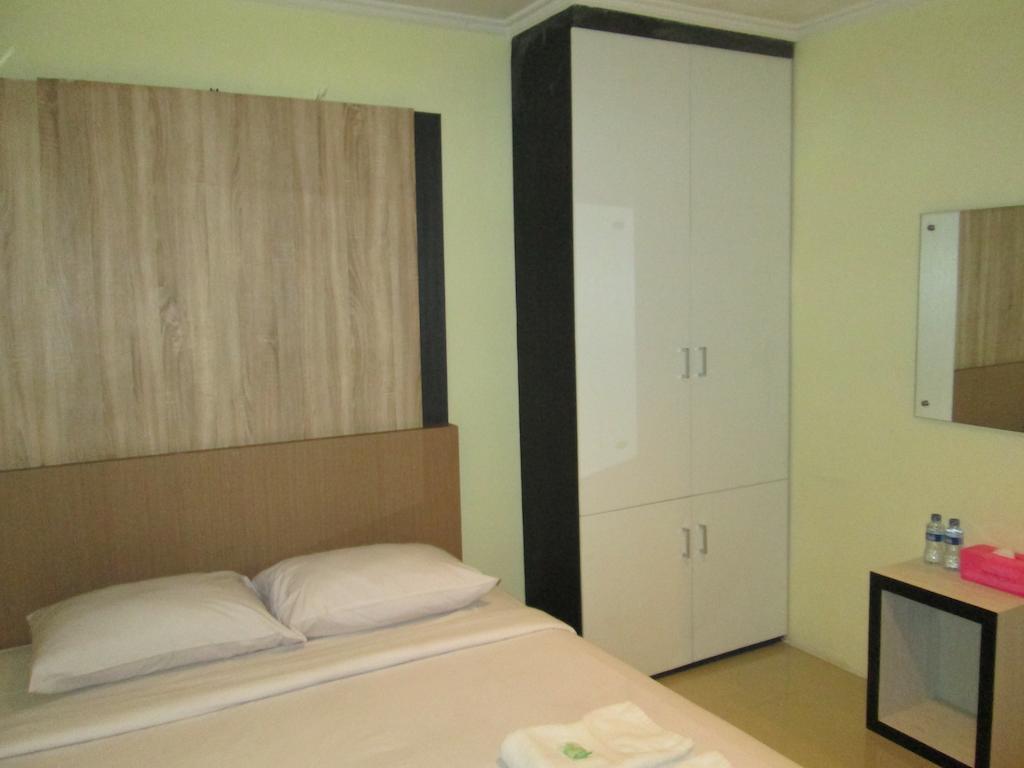 Green Leaf Inn Понтианак Стая снимка